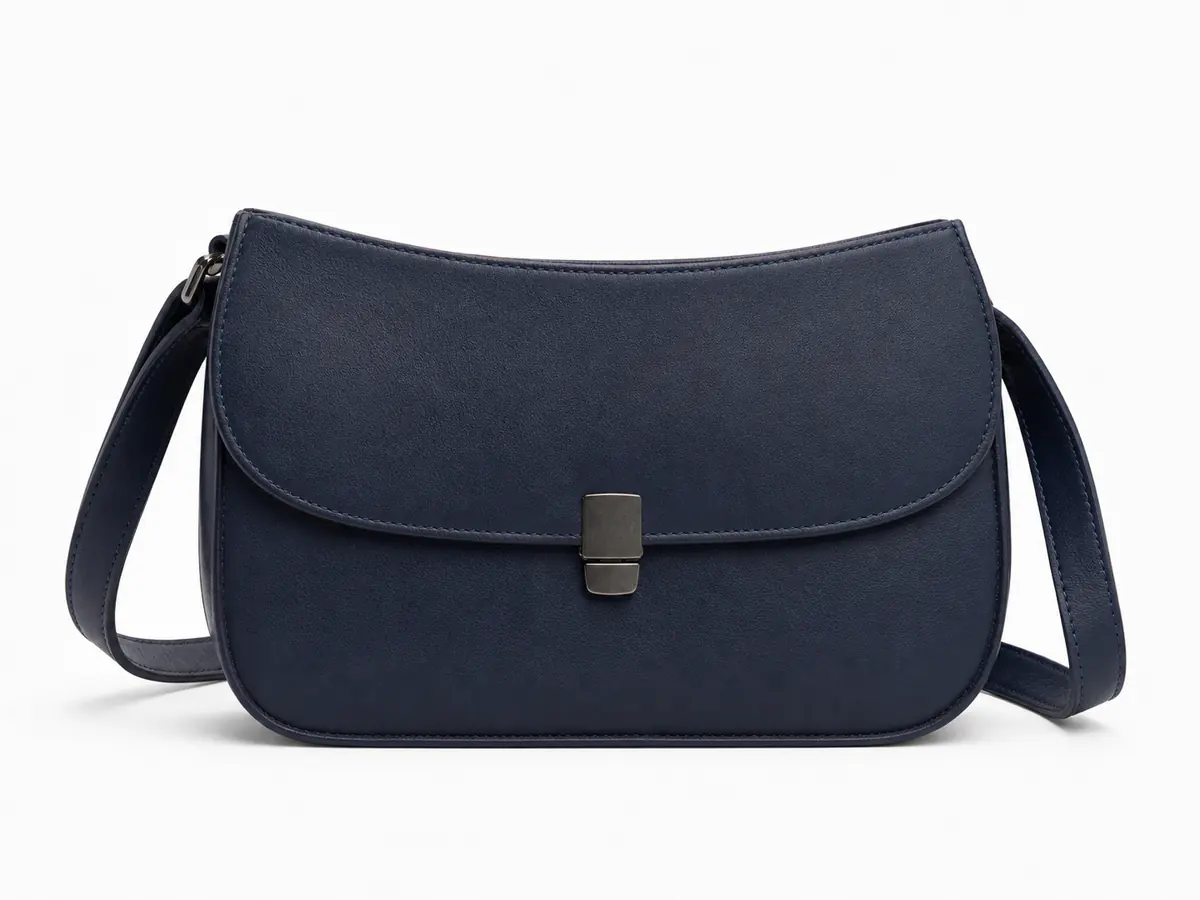The clean introduction: navy handbag packshot study